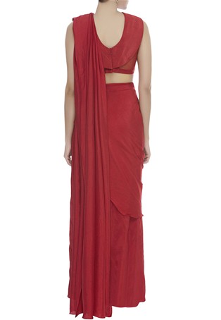 red pre-draped saree with embroidered blouse