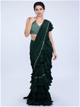 green ready pleated saree with frilled layers at the hem