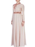 beige high collar gown with shiny bead detailing