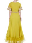 yellow floor length gown with embroidered sleeves