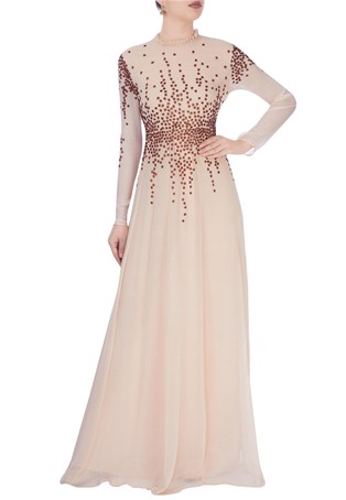 beige high collar gown with stud details